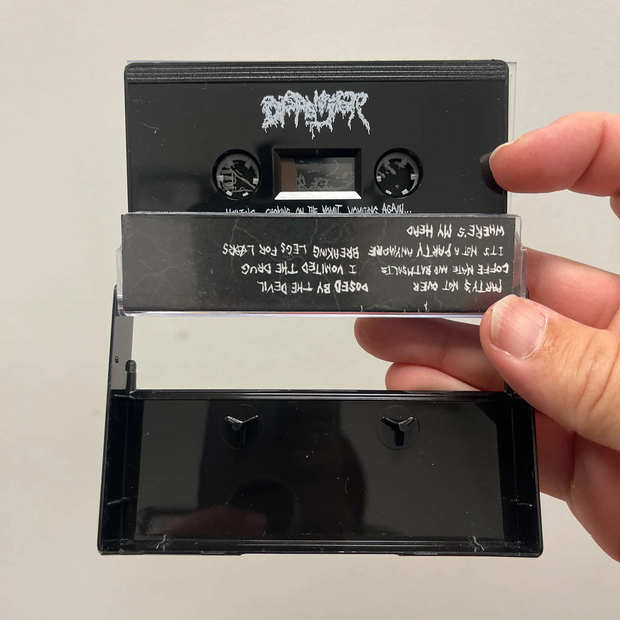 Dispenser: Vomiting... Choking on the Vomit... Vomiting Again... and then Choking on the Vomit Again cassette - Image 2